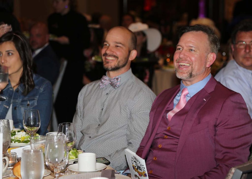 Image of Tim Gebhart and Sean Casey sitting at a Gala table.