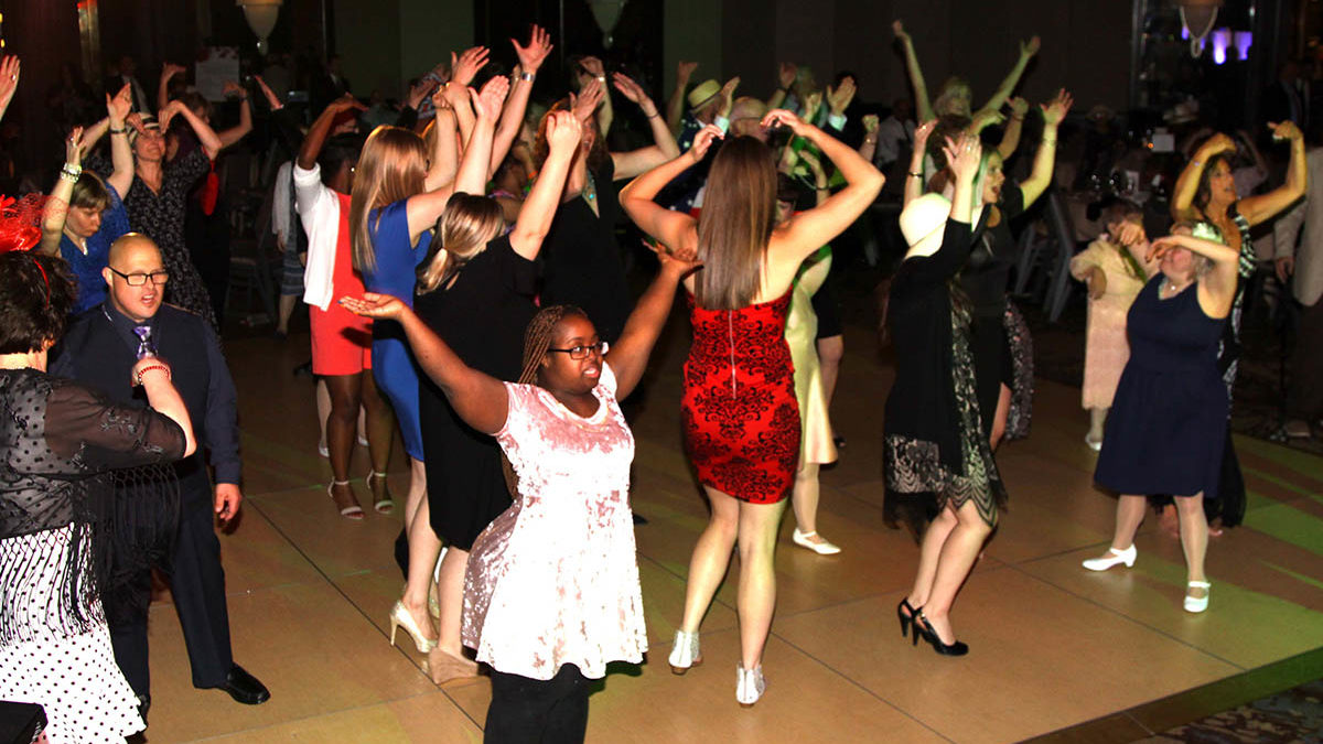 Image of people dancing at Emmaus Gala